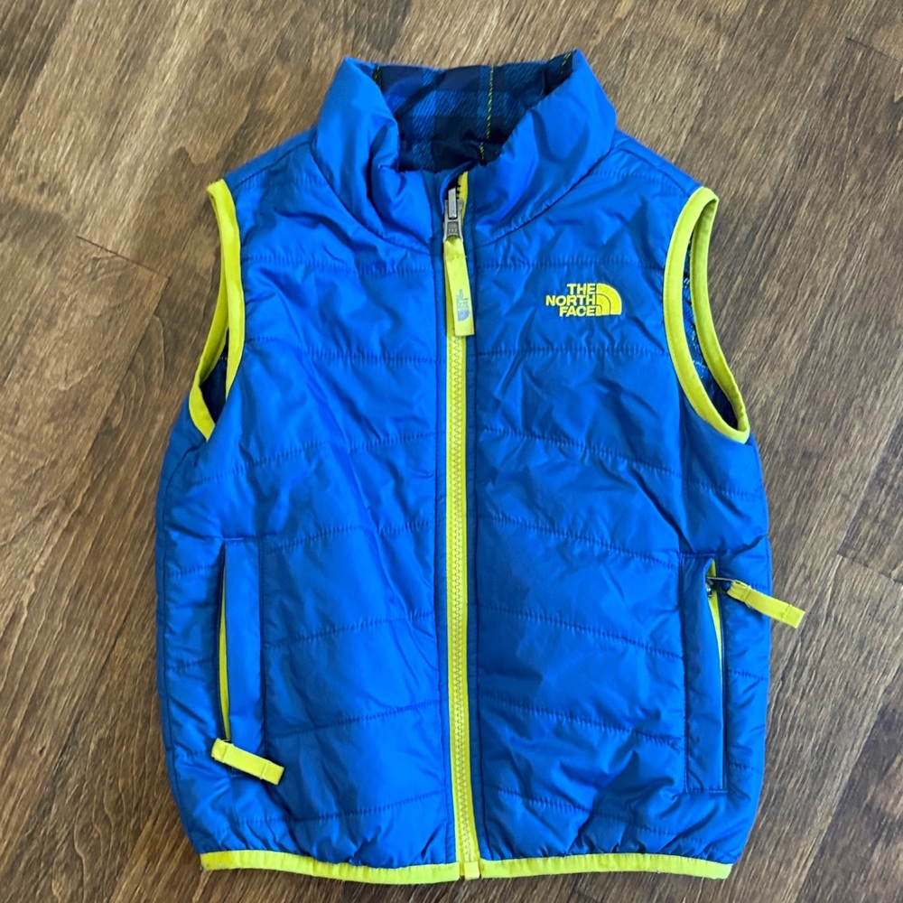 The North Face Vibrant Blue Vest with Yellow Trim